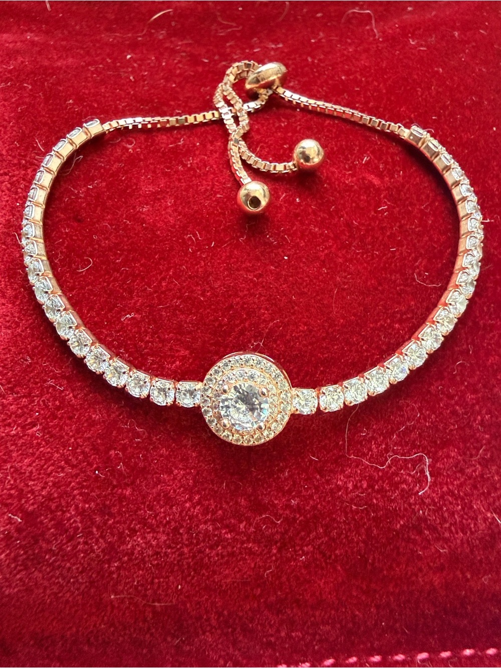 Rose Gold Crystal Slider Tennis Bracelet with Center Halo Accent